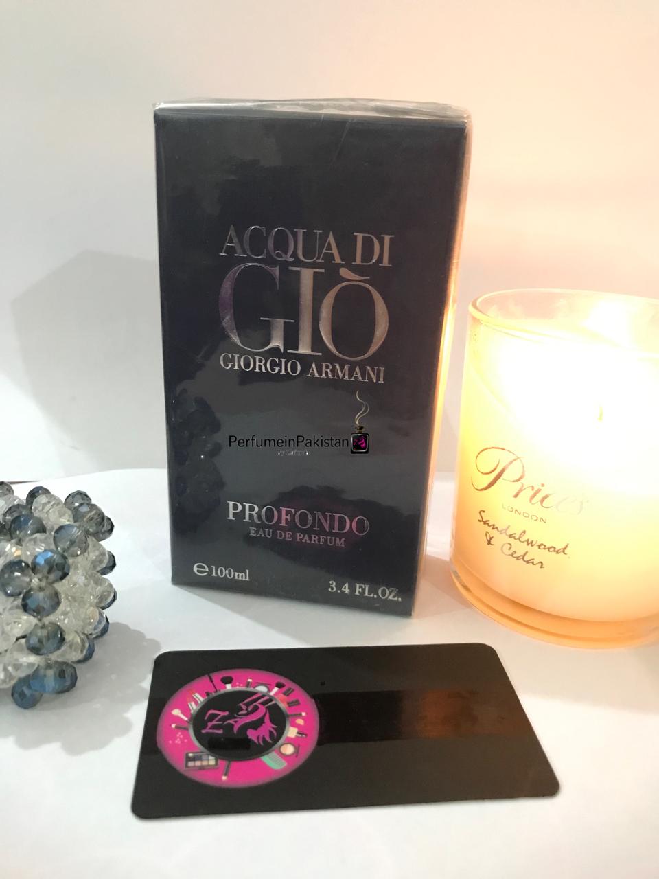 Giorgio Armani Acqua di Giò Profondo Eau de Parfum 100ml perfume box displayed with a candle and Perfume in Pakistan branding