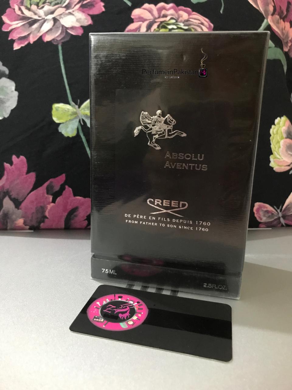 Creed Absolu Aventus 75ml perfume box displayed on a white surface.