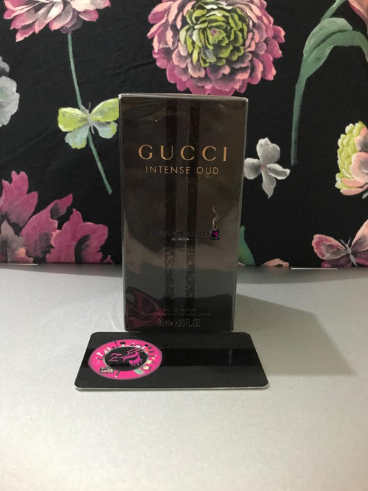 Gucci Intense Oud Eau de Parfum 90ml perfume bottle and packaging.