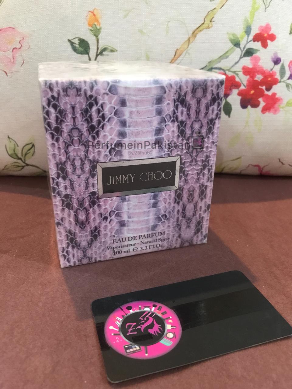 Jimmy Choo Eau de Parfum 100ml women's perfume box with signature python-inspired design displayed on a tabletop background | Perfume in Pakistan