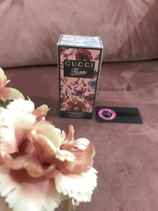 Gucci Flora Gorgeous Gardenia Eau de Parfum 100ml perfume box displayed with floral decor and Perfume in Pakistan branding card
