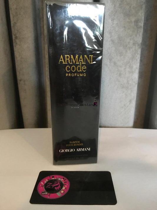 Armani Code Profumo by Giorgio Armani men's perfume box displayed on a white surface with PerfumeinPakistan branding card and elegant gray curtain background.
